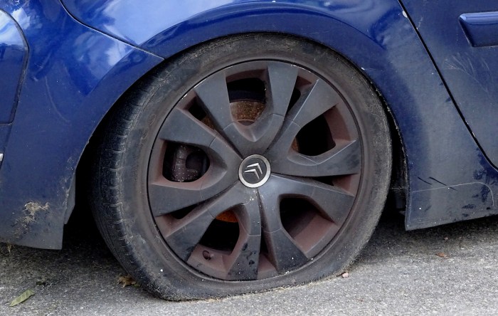 Car With Flat Tire Free Stock Photo - Public Domain Pictures